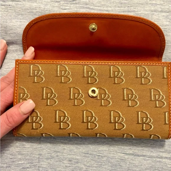 Dooney & Bourke Ivory and Brown Travel Bag - Picture 9 of 11